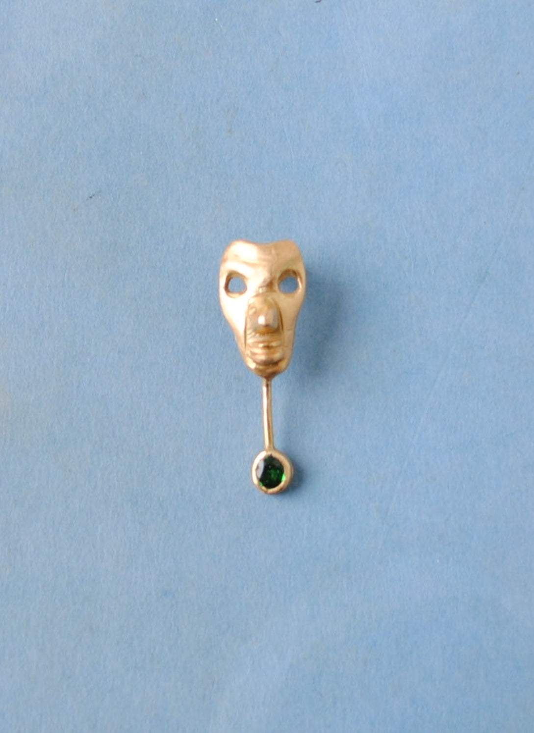 Customized mask earring 18 CT gold and green Tsavorite